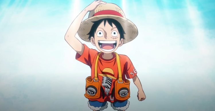 Luffy as a kid looks delighted with a shinng background in one piece: red