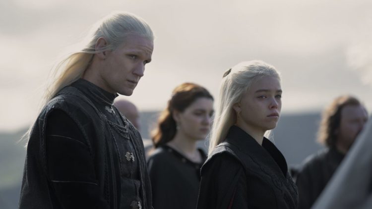 Matt Smith as Daemon and Milly Alcock Young Princess Rhaenyra Targaryen looking over the funeral in House of the Dragon