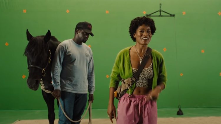 Daniel Kaluuya and Keke Palmer in front of a green screen in Nope.