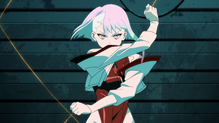Emi Lo as Lucy posing against a wall in Cyberpunk: Edgerunners