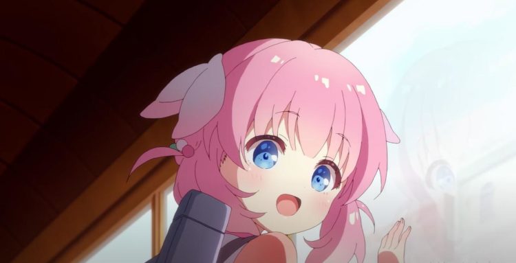 Haizakura looks excitedly out of the window on a train to the city centre