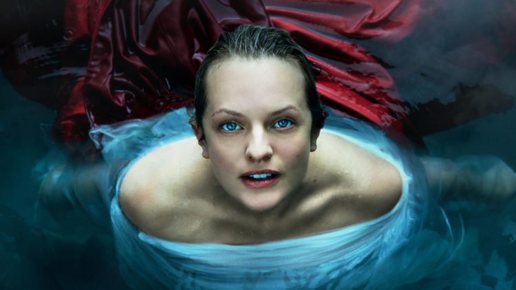 June (Elisabeth Moss) in Hulu's vertical key art for The Handmaid's Tale