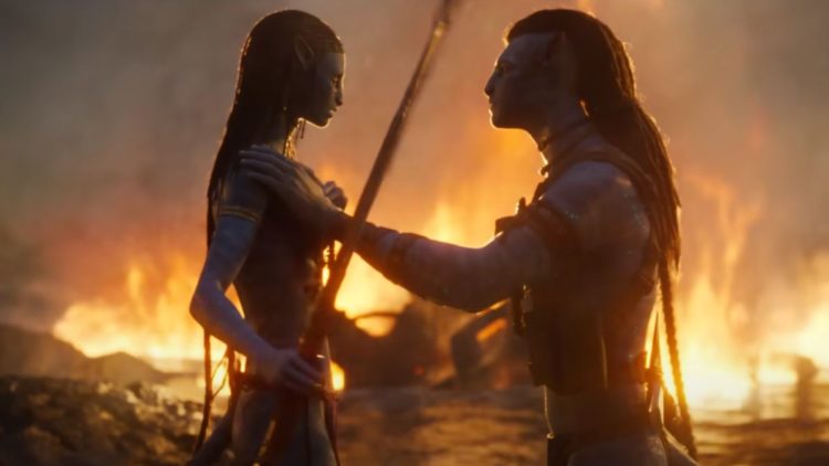 Jake and Neytiri standing in front of fire in Avatar: The Way of Water