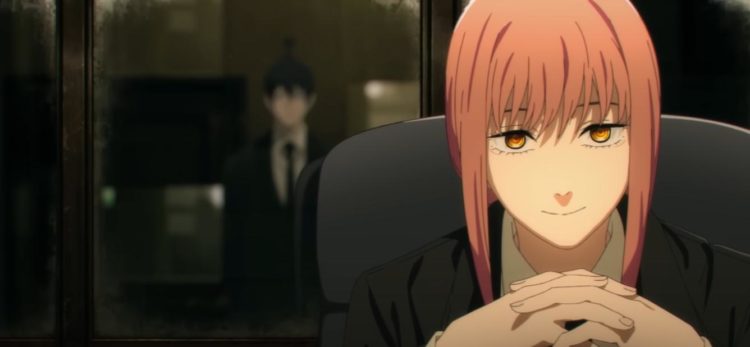 Makima smiles sitting in her office with Aki reflected in the glass behind her