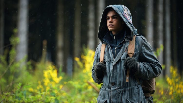 Amir Wilson with his hood up in His Dark Materials Season 3