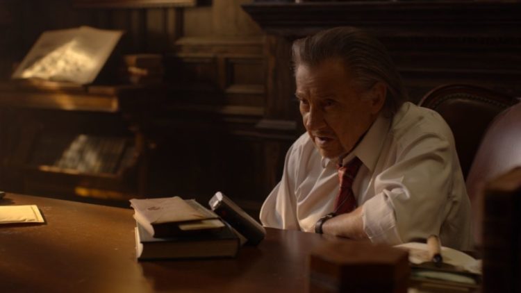 Harvey keitel using a tape recorder at a desk in National Treasure: Edge of History