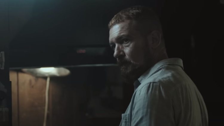 Antonio Banderas looking over his shoulder in Code Name Banshee