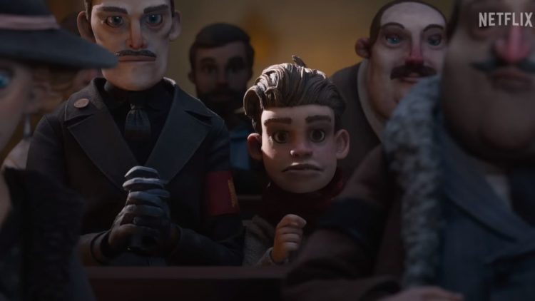 Podesta in a crowd with a boy in Guillermo del Toro's Pinocchio