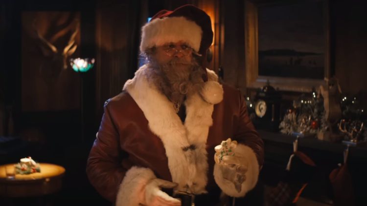 David Harbour as Santa eating a cookie in Violent Night