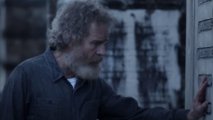 Bryan Cranston touching a grave in Your Honor