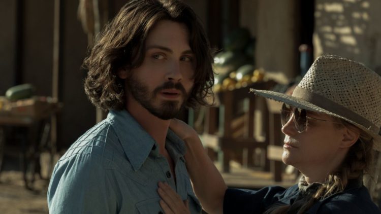 Logan Lerman in a blue shirt in Hunters Season 2