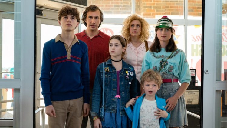 Adam Driver as Jack, Greta Gerwig as Babette, May Nivola as Steffie, Raffey Cassidy as Denise, Sam Nivola as Heinrich standing together outdoors Wh...