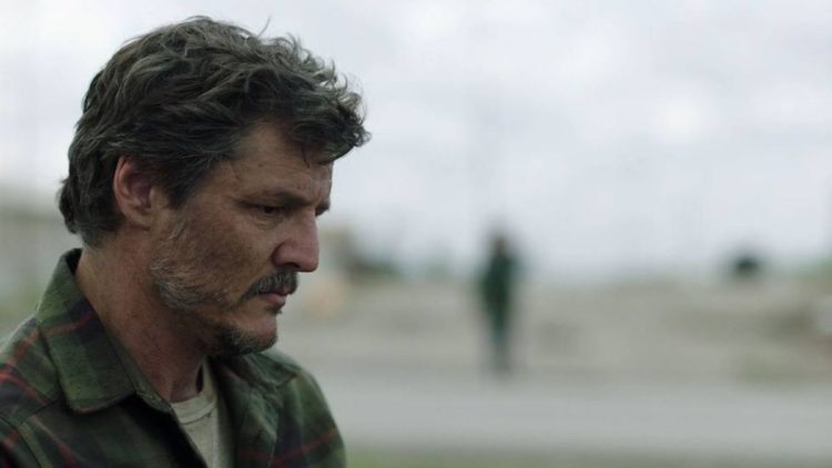 Pedro Pascal as Joel looking at the ground in HBO's The Last of Us