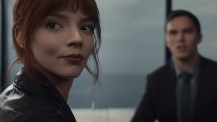 Anya Taylor-Joy and Nicholas Hoult at a dining table in The Menu