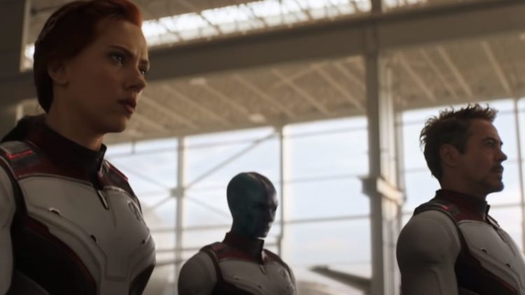 Natasha Romanoff, Tony Stark, and Nebula walking in white time travelling suits in Avengers: Endgame