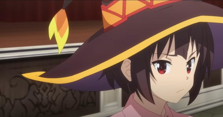 Megumin looks over her shoulder whilst wearing he Crimson academy uniform and hat