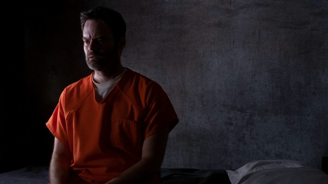 Bill Hader as Barry sitting in a grey prison cell in orange overalls in Barry