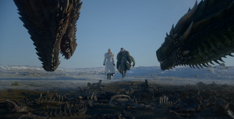 John Snow and Daenerys walk towards her dragons